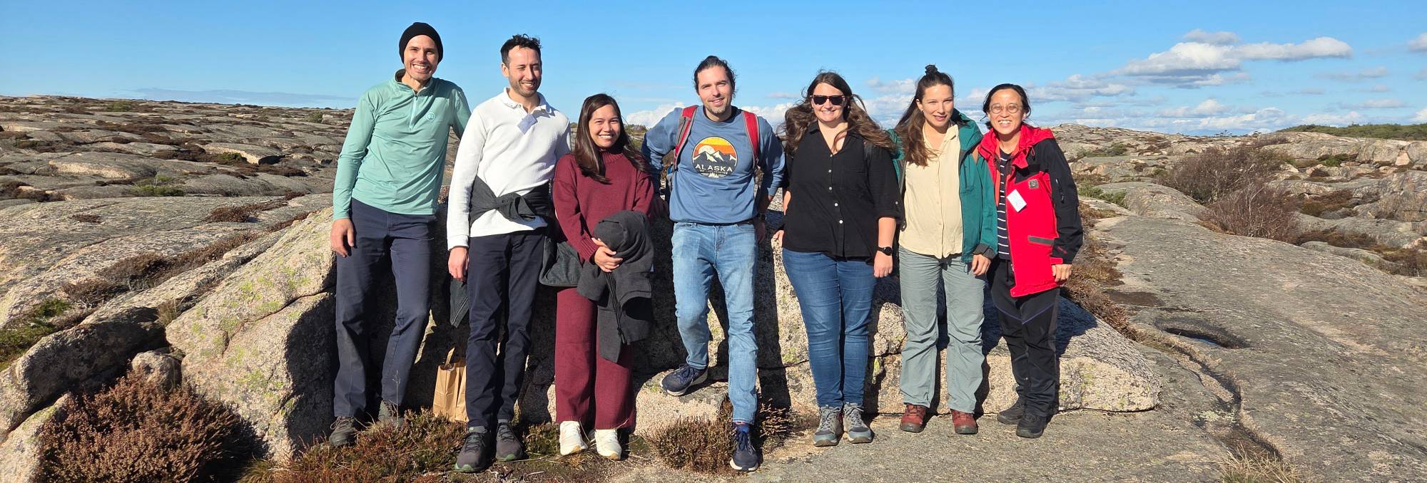 group shot on the rocky beach